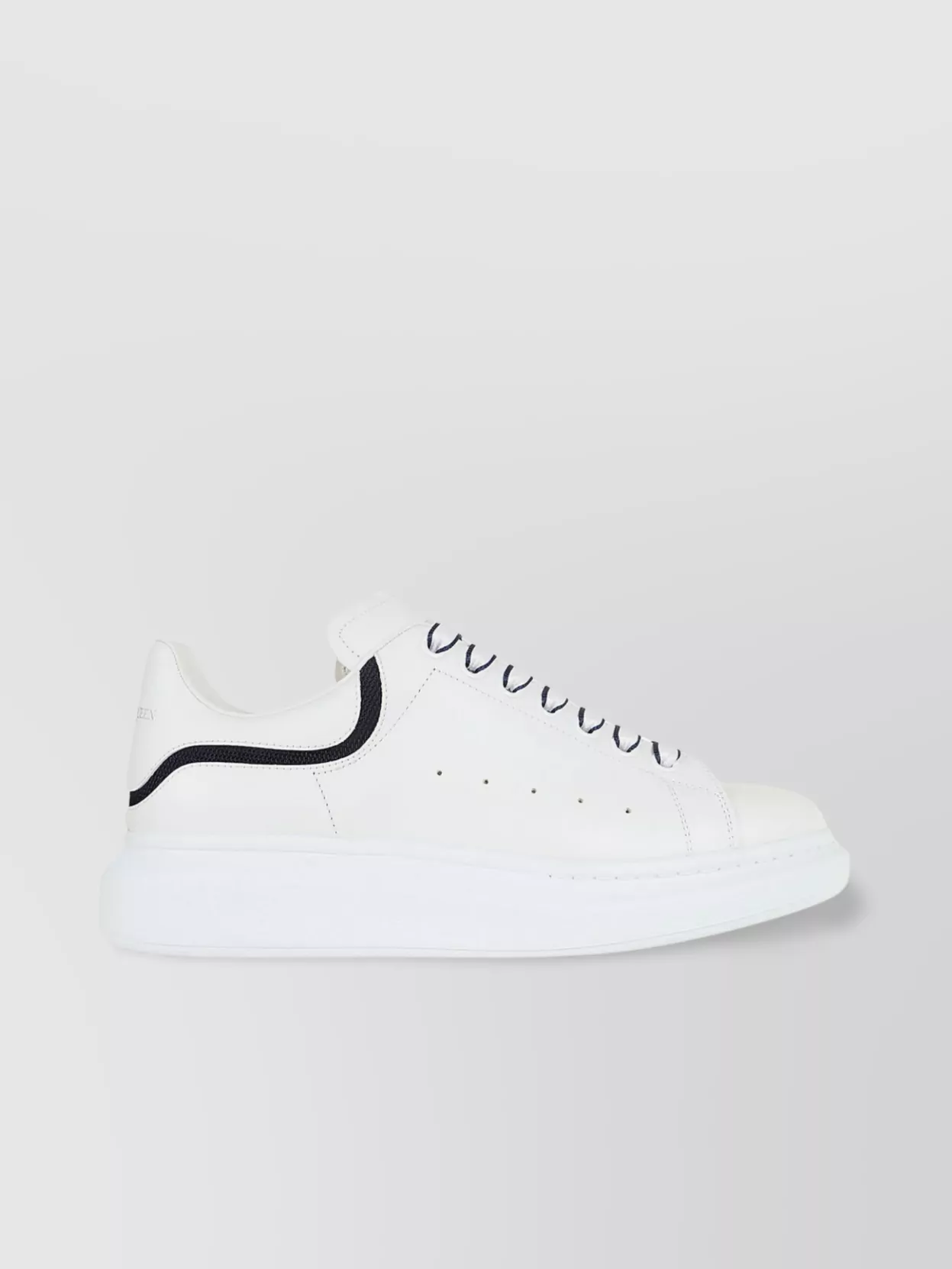 Alexander McQueen   Oversized leather sneakers with perforated sole