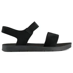 Black suede sandals with elastic band and a flat sole