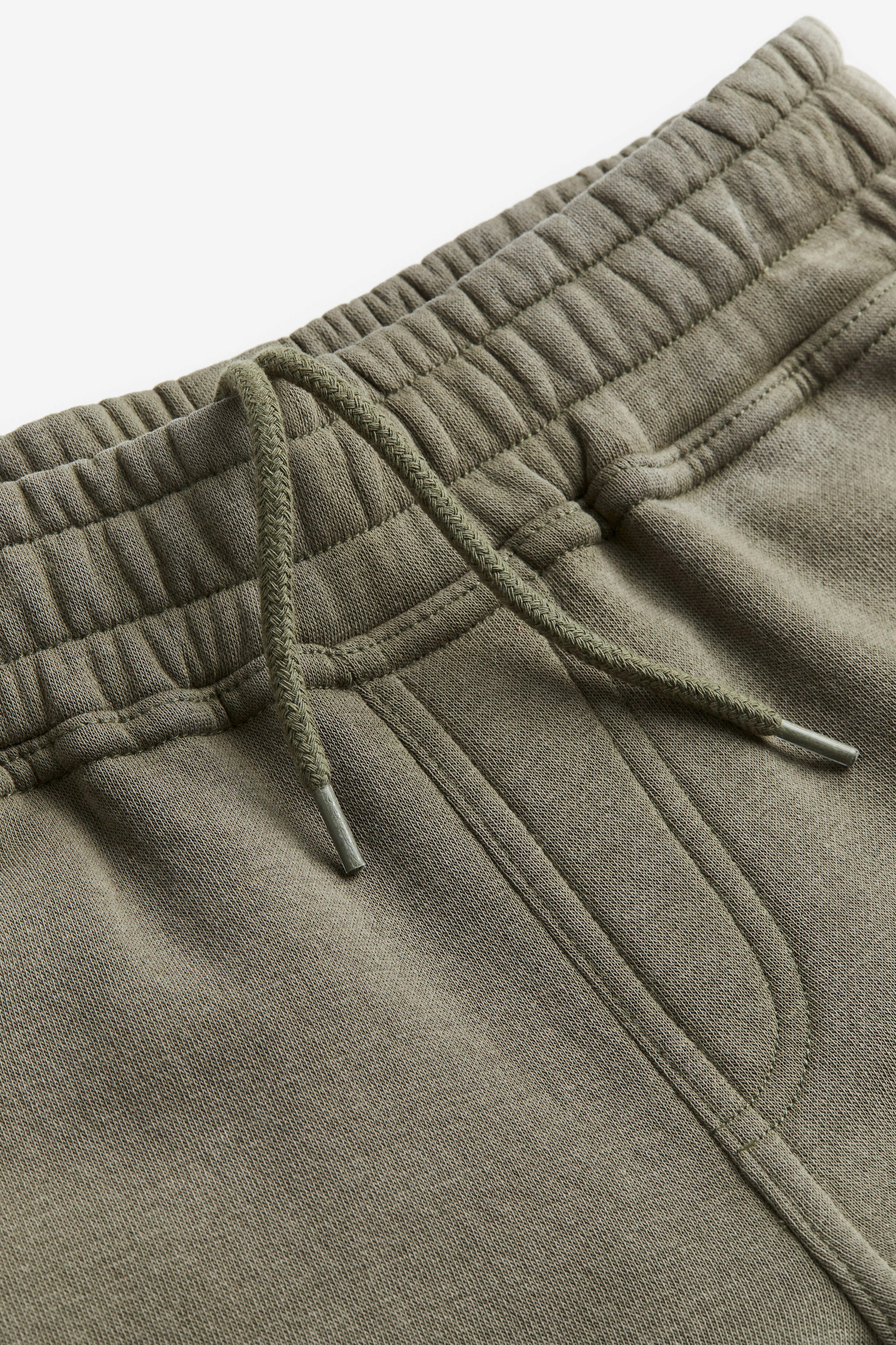 Carpenter joggers - Regular waist - Long - Washed khaki green - Kids | H&M GB