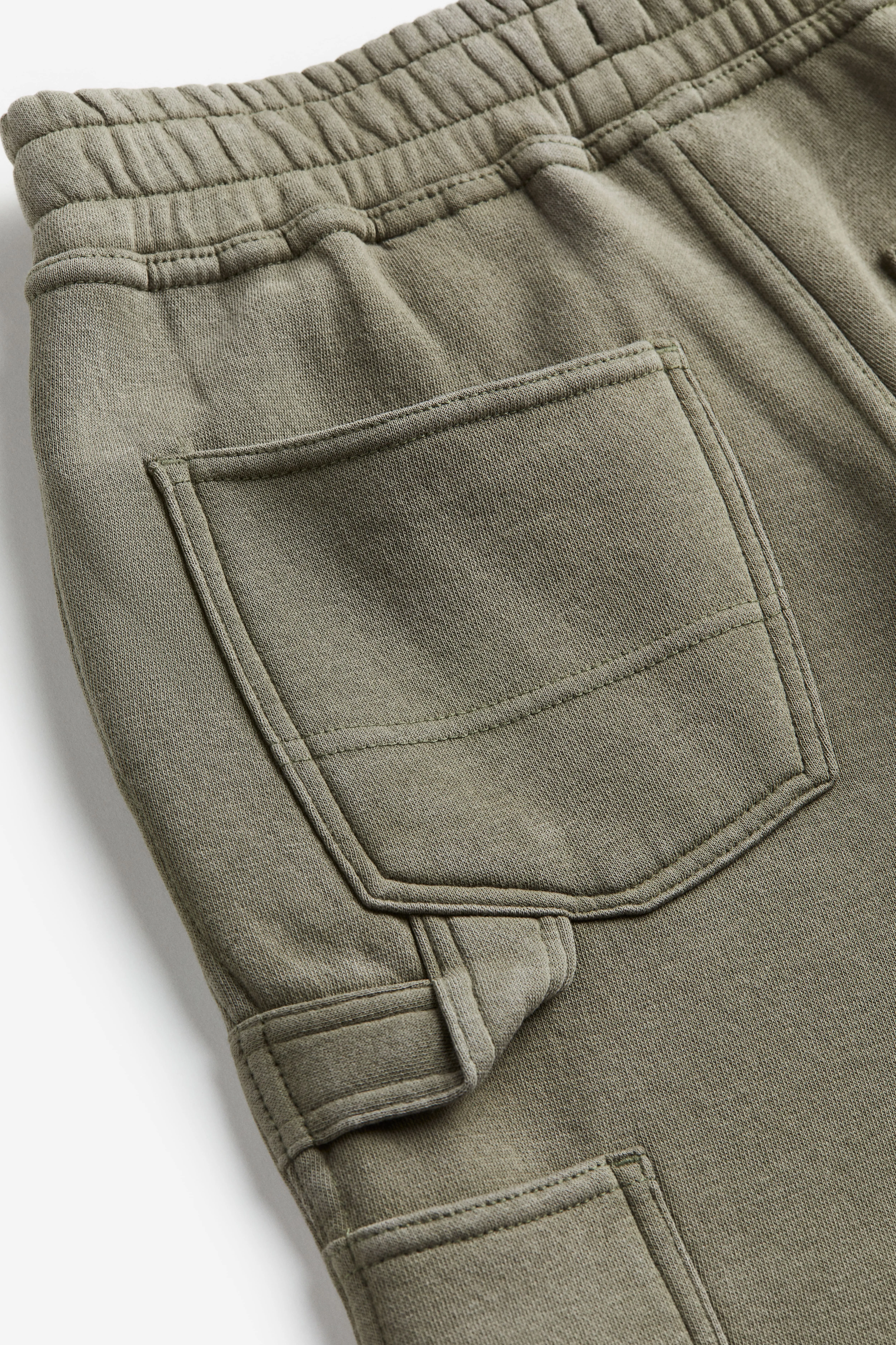 Carpenter joggers - Regular waist - Long - Washed khaki green - Kids | H&M GB