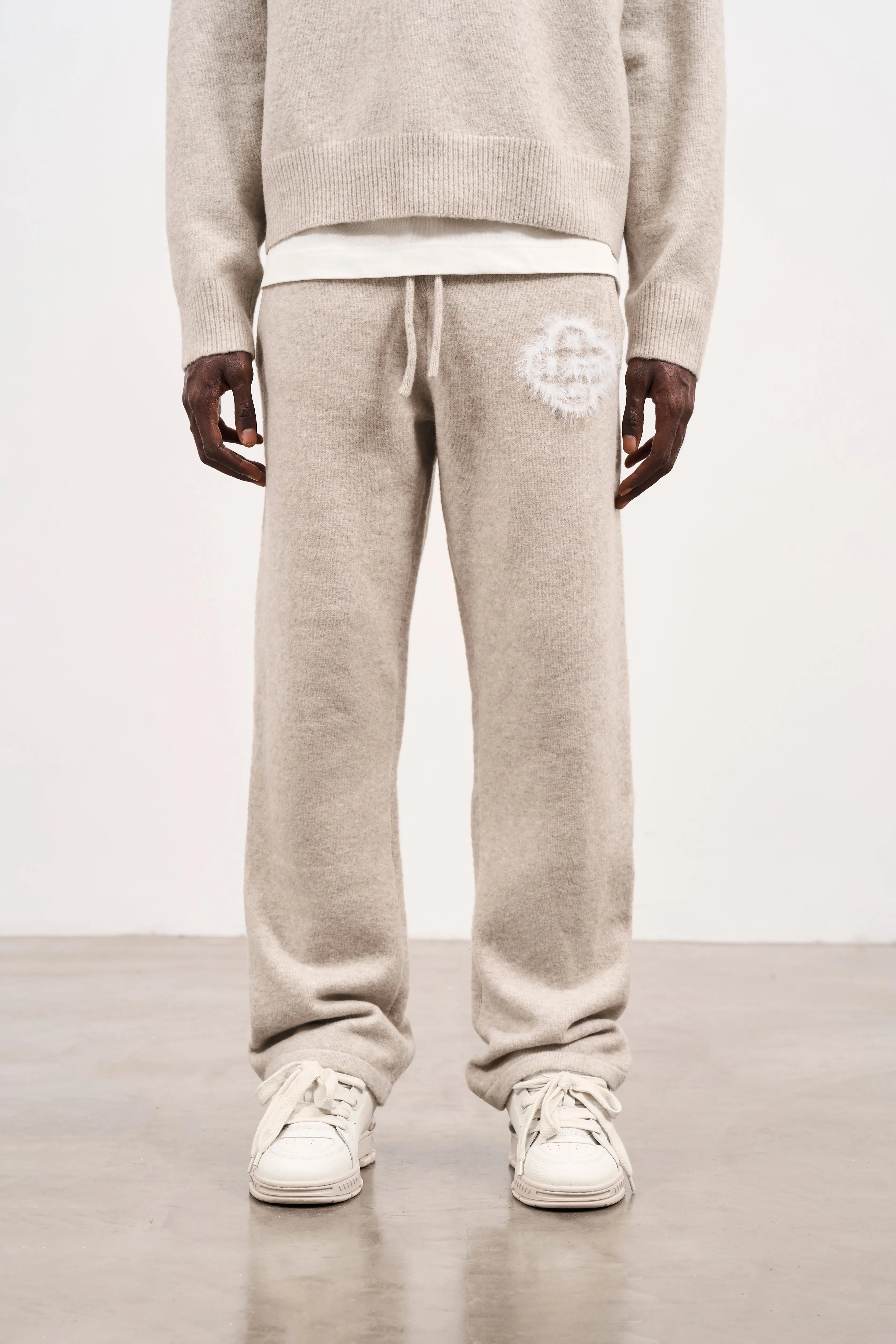 FLUFFY EMBLEM KNITTED JOGGERS - BEIGE