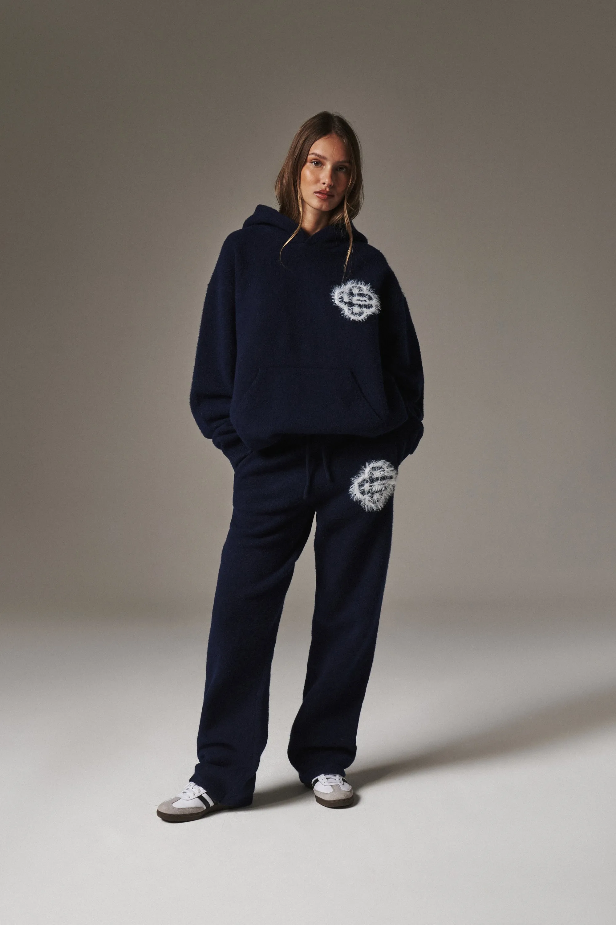 FLUFFY EMBLEM KNITTED JOGGERS - NAVY